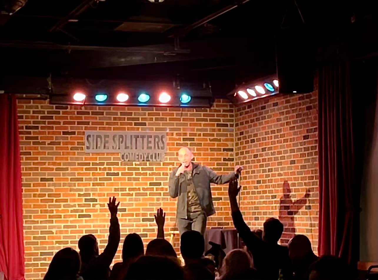 Hugh Carey performing stand up comedy at Side Splitters Comedy Club in Tampa FL